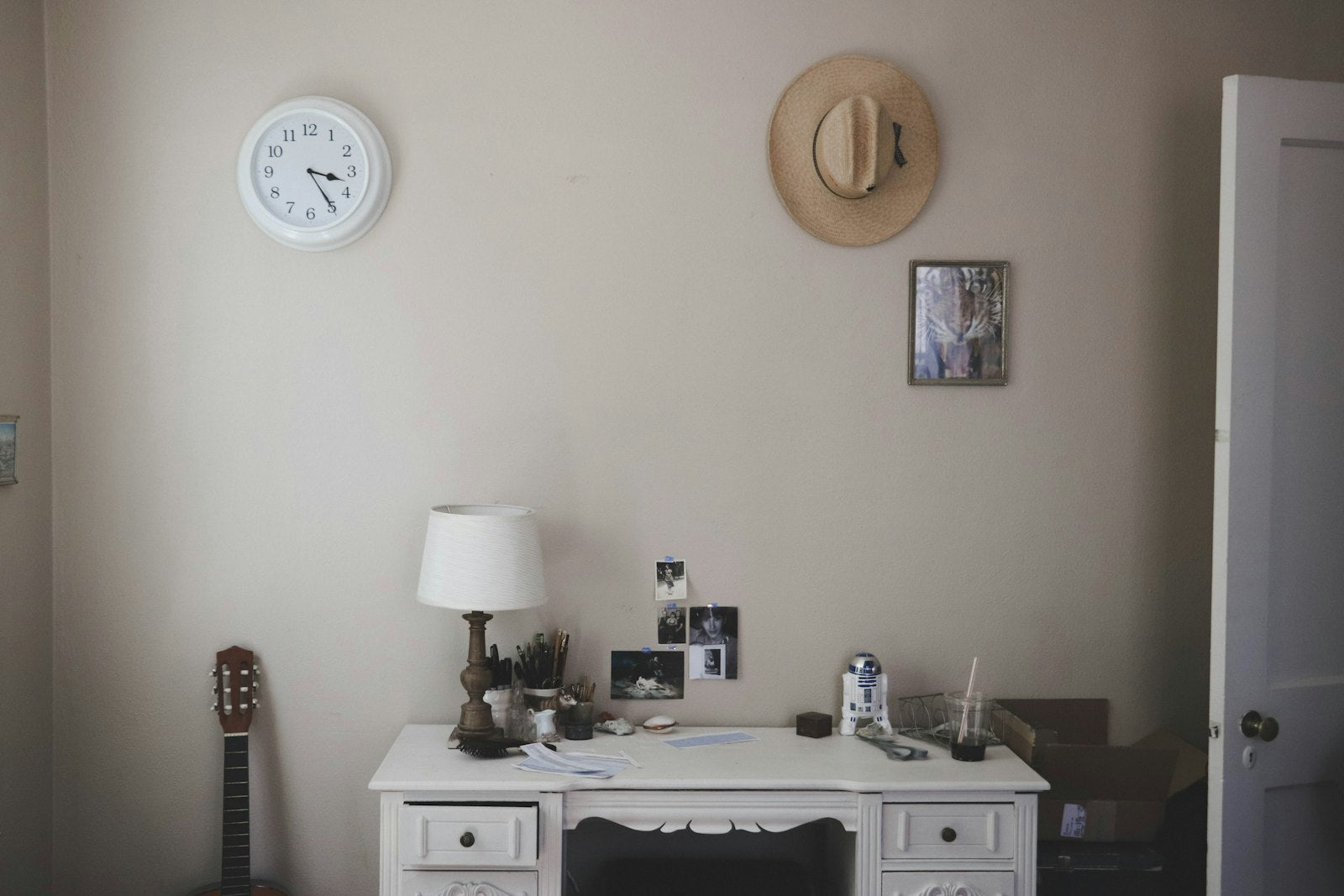 Ceramic table lamp with linen shade on a desk